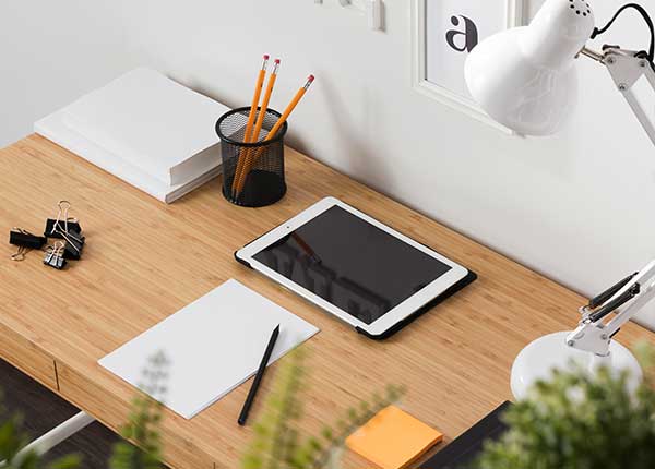 Neat and tidy workspace with tablet on desk